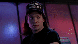Wayne de Wayne's World réagissant avec surprise